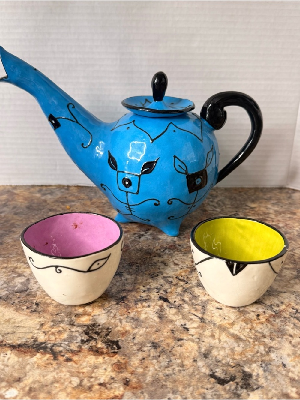 Kri Kri Hand-Painted Blue Ceramic Teapot with Pink and Yellow Accent Cups
